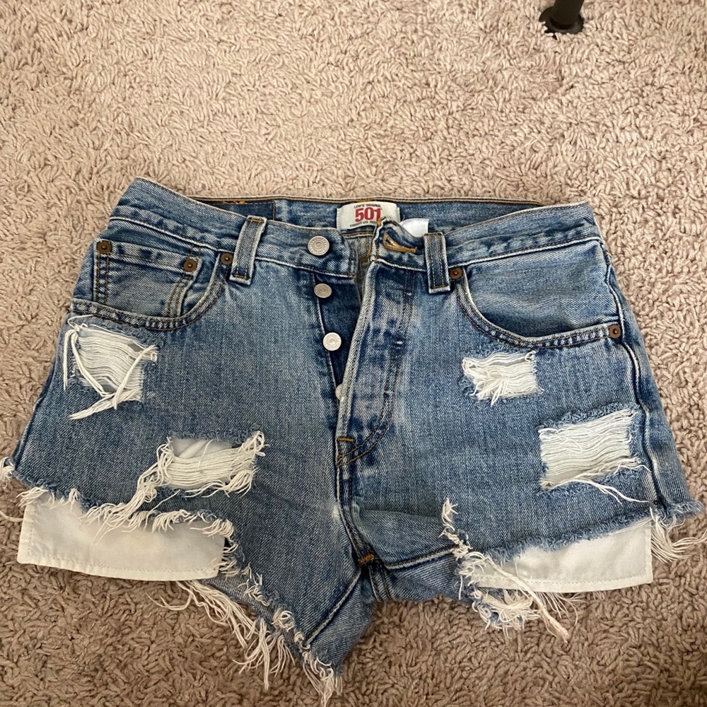 Levi ripped Jean shorts